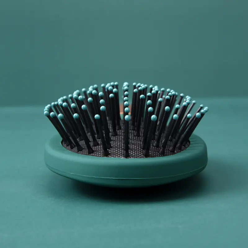 Brosse de massage vert foncé pour cheveux lisses et bouclés